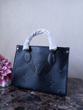 Louis Vuitton Black Embossed Leather Satchel